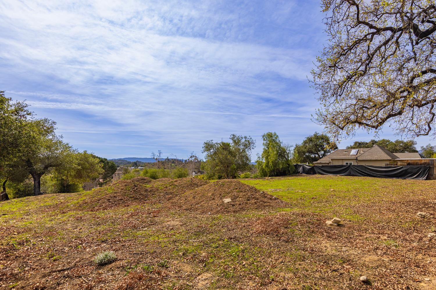 1090 Cuyama Road Ojai, CA 93023 - Photo 5 of 11 a view of a field with an trees