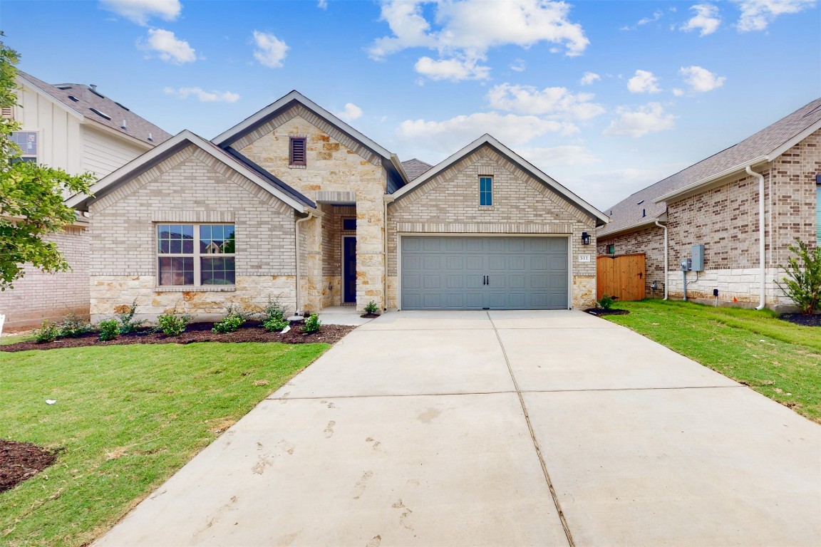 311 Fawn Riv Run Kyle, TX 78640 - Photo 1 of 1 a view of a house with a yard