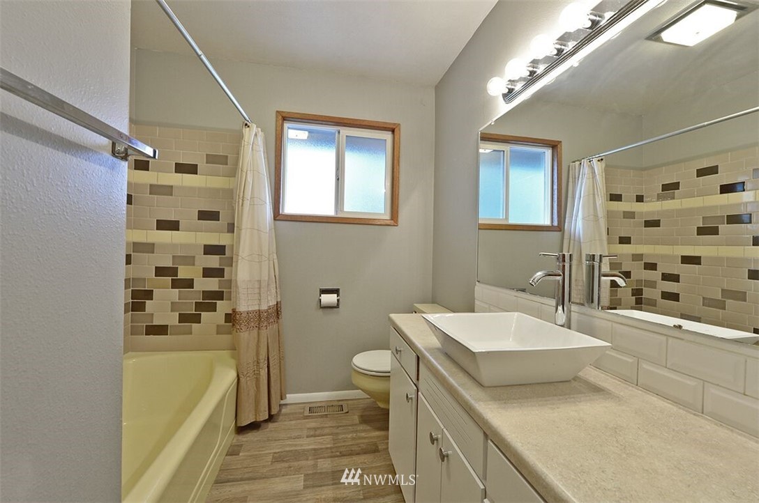 180 Beard Road Lynden, WA 98264 - Photo 17 of 27 a bathroom with a sink a toilet and shower