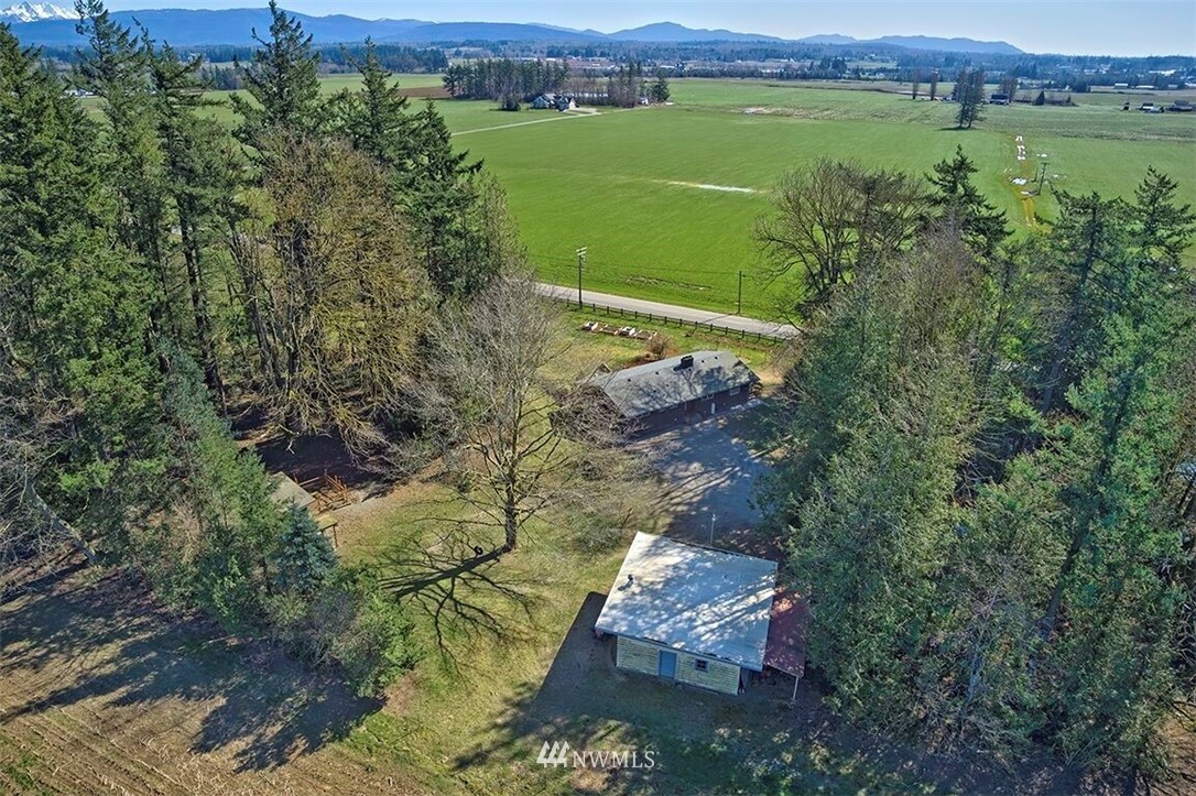 180 Beard Road Lynden, WA 98264 - Photo 3 of 27 a view of a lake with a mountain