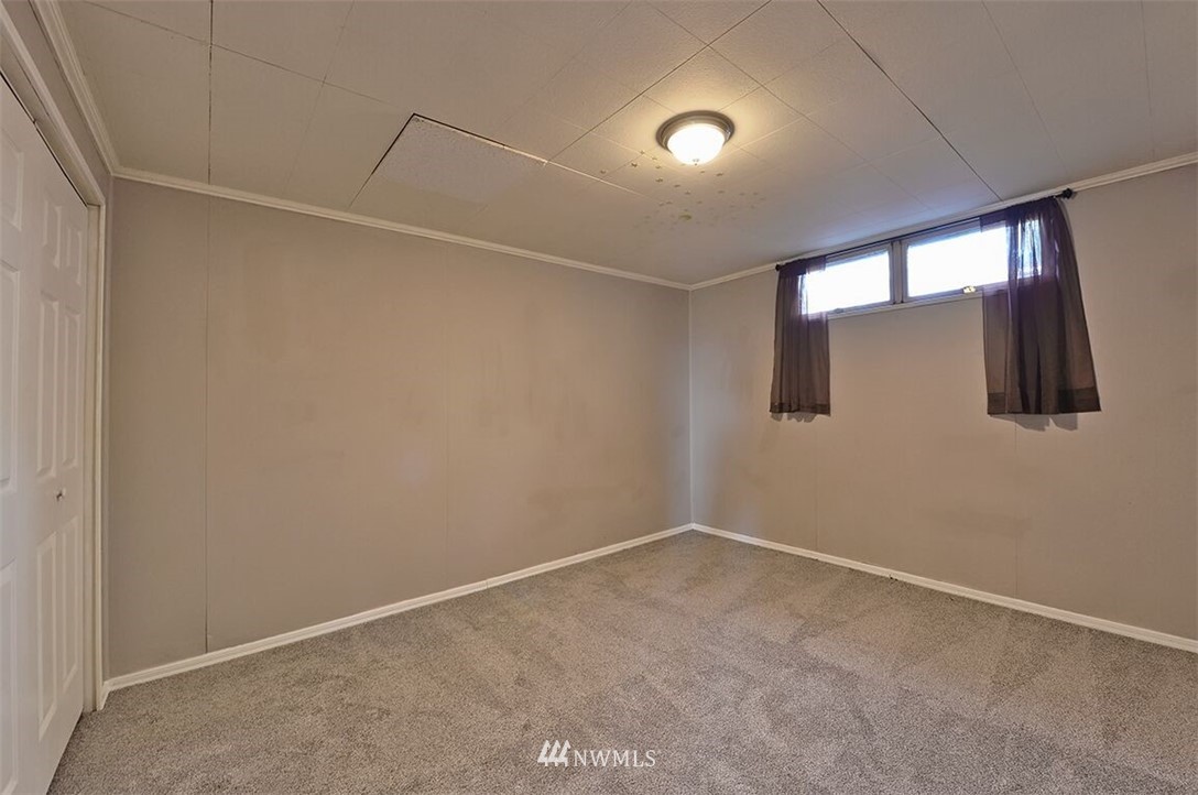 180 Beard Road Lynden, WA 98264 - Photo 21 of 27 a view of an empty room with a window