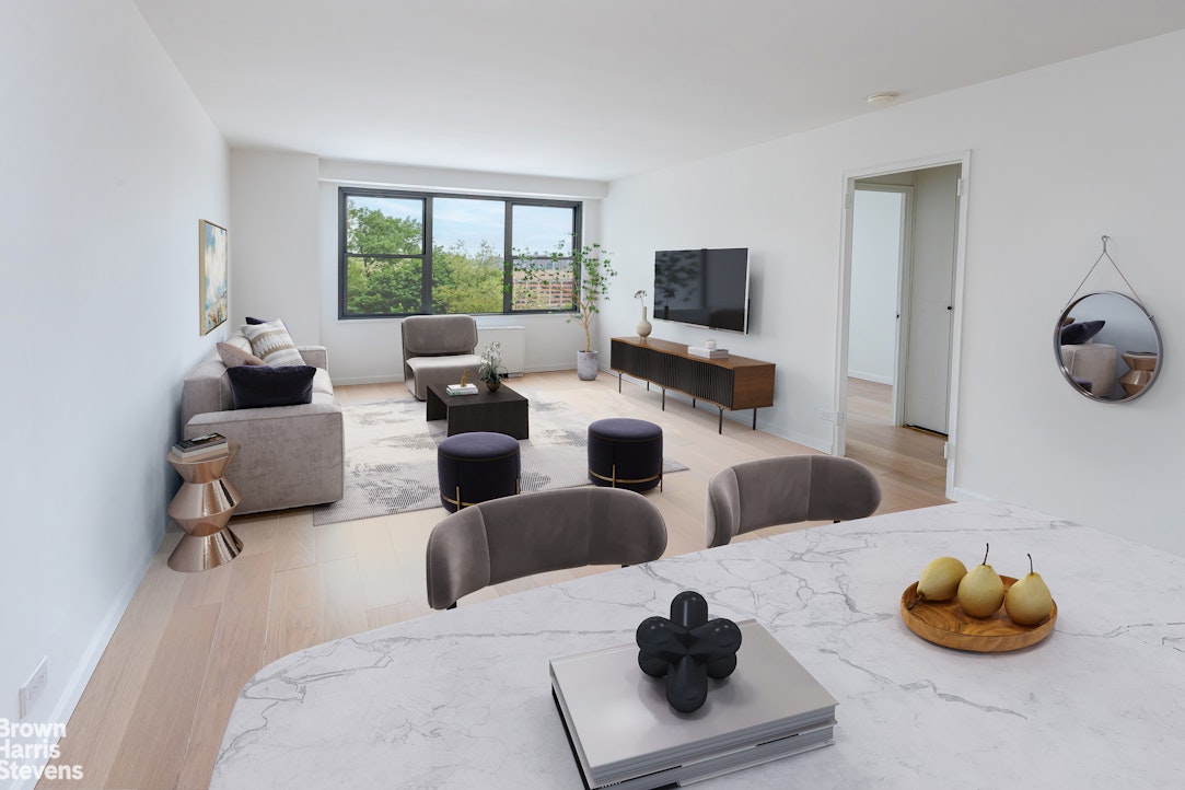 2500 Johnson Avenue, Unit 3B Bronx, NY 10463 - Photo 2 of 42 a living room with furniture and a flat screen tv