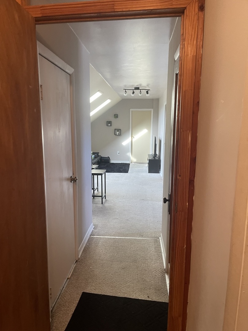 5631 West Cornelia Avenue Chicago, IL 60634 - Photo 13 of 28 a view of a hallway