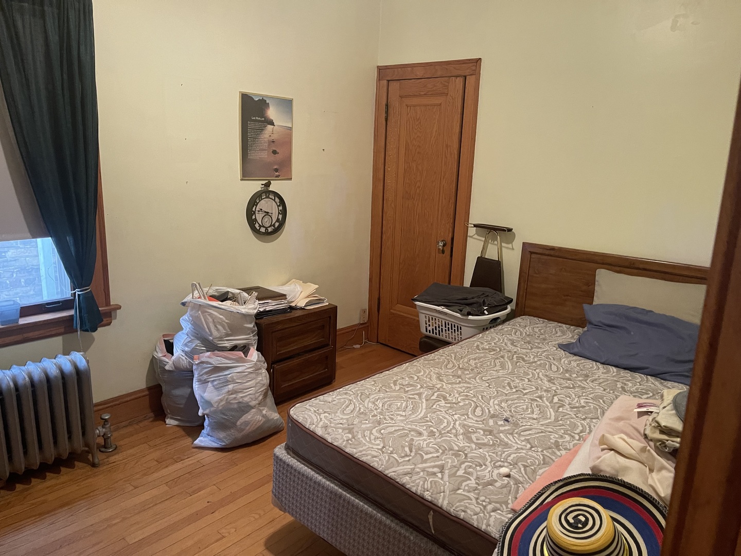 5631 West Cornelia Avenue Chicago, IL 60634 - Photo 9 of 28 a bed room with a bed and a mirror