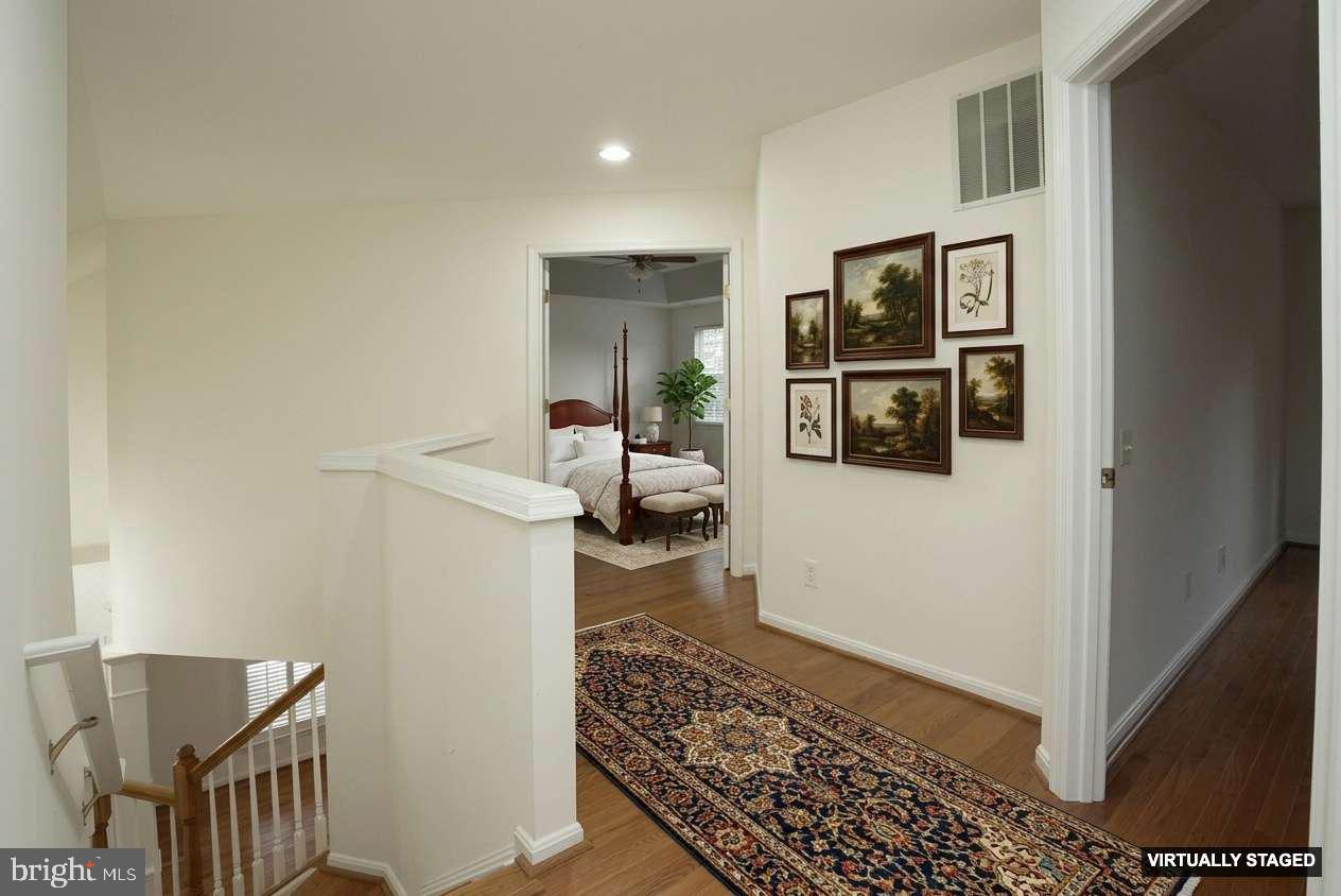 2448 Leyland Ridge Road Herndon, VA 20171 - Photo 18 of 32 Inviting hallway with elegant decor.