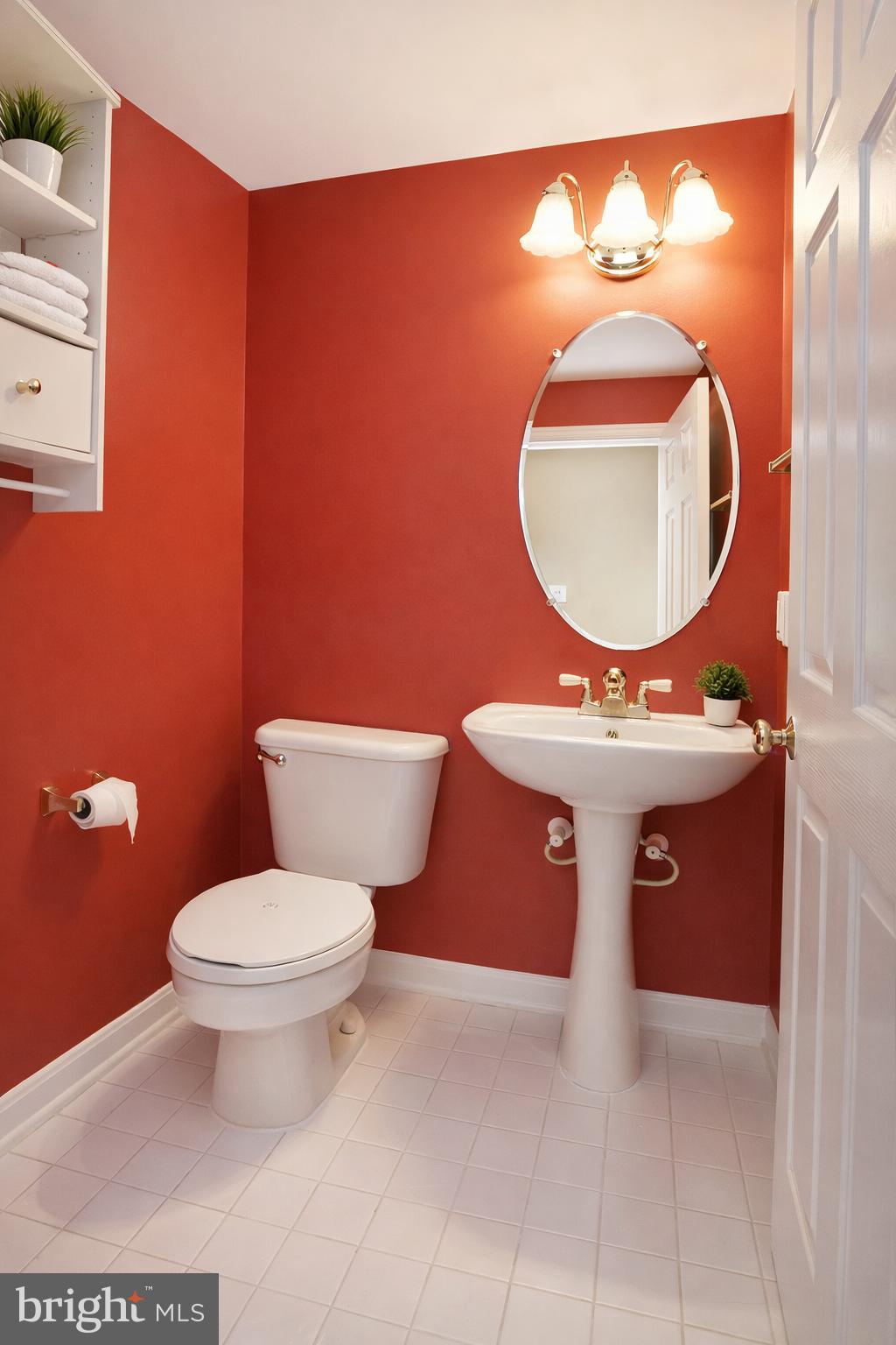 2448 Leyland Ridge Road Herndon, VA 20171 - Photo 19 of 62 Charming red-hued bathroom retreat.