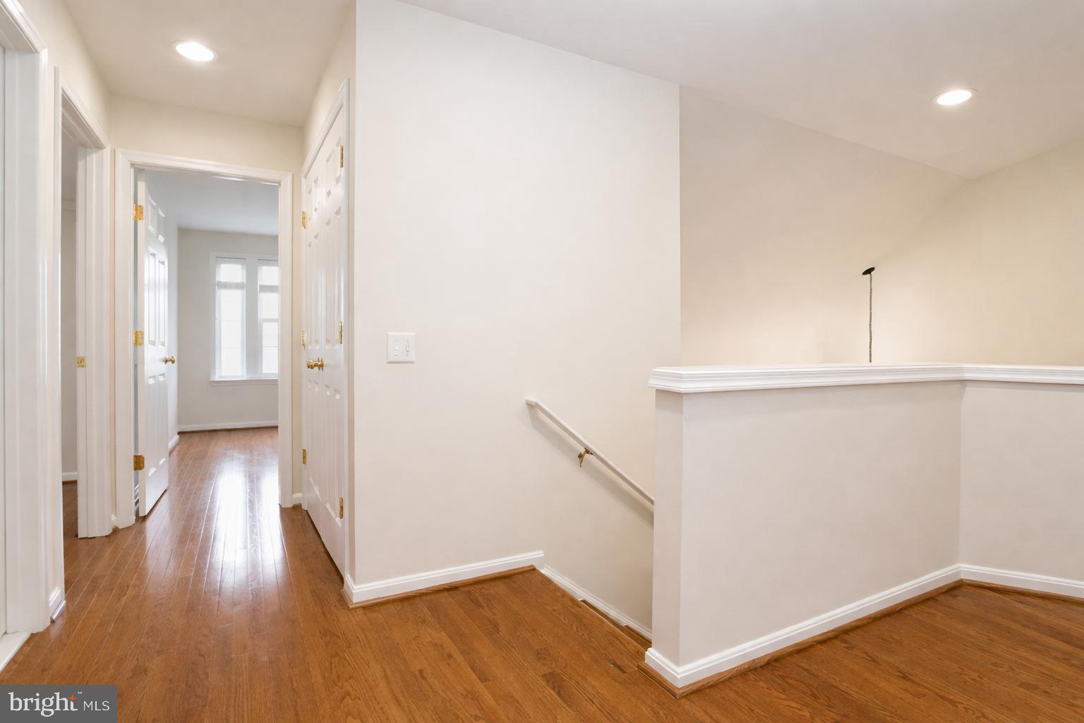 2448 Leyland Ridge Road Herndon, VA 20171 - Photo 43 of 62 Bright and inviting hallway with warm tones.