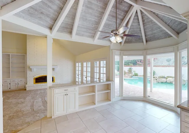 a bathroom with a sink a vanity and a bathtub