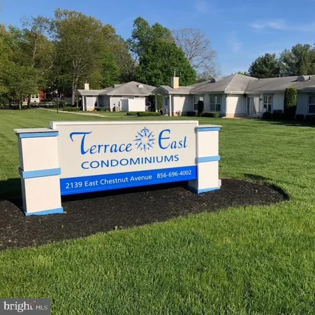 a view of a sign board with a big yard