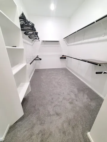 a view of a room with racks on the wall