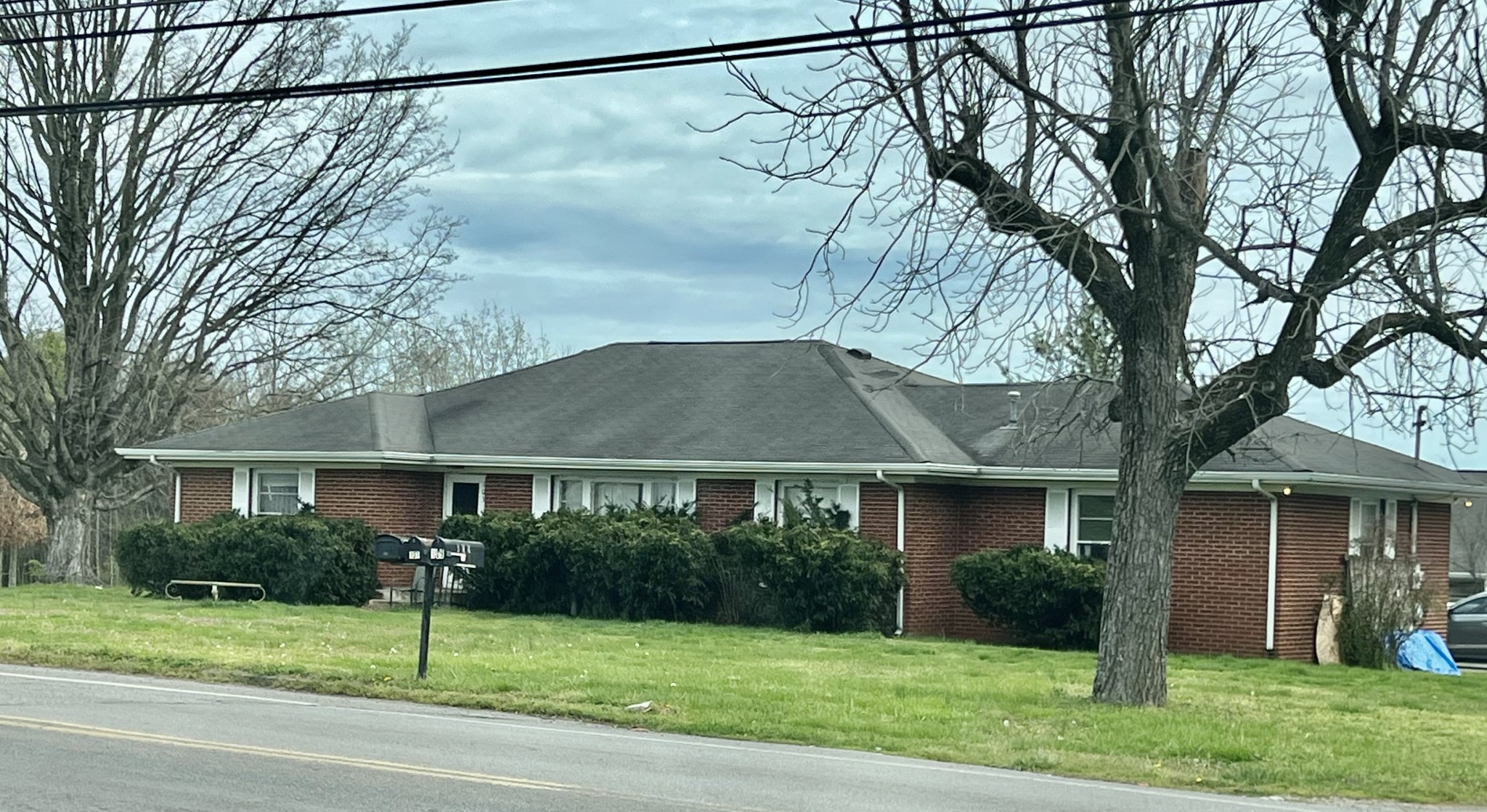 103 Almaville Road Smyrna, TN 37167 - Photo 1 of 3 a front view of a house with a yard and garage