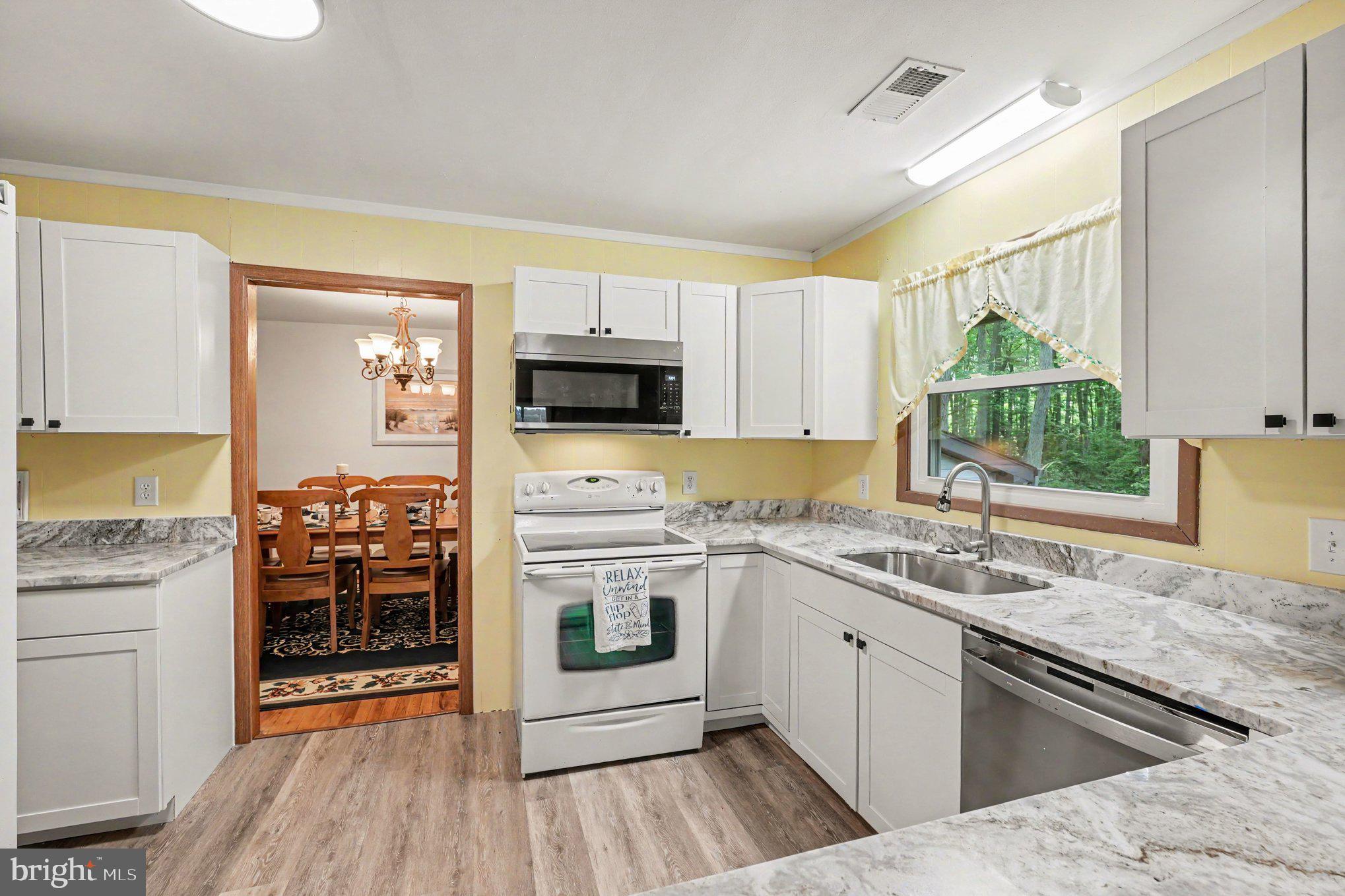 306 Liberty Road Reedville, VA 22539 - Photo 12 of 46 New flooring and granite countertops