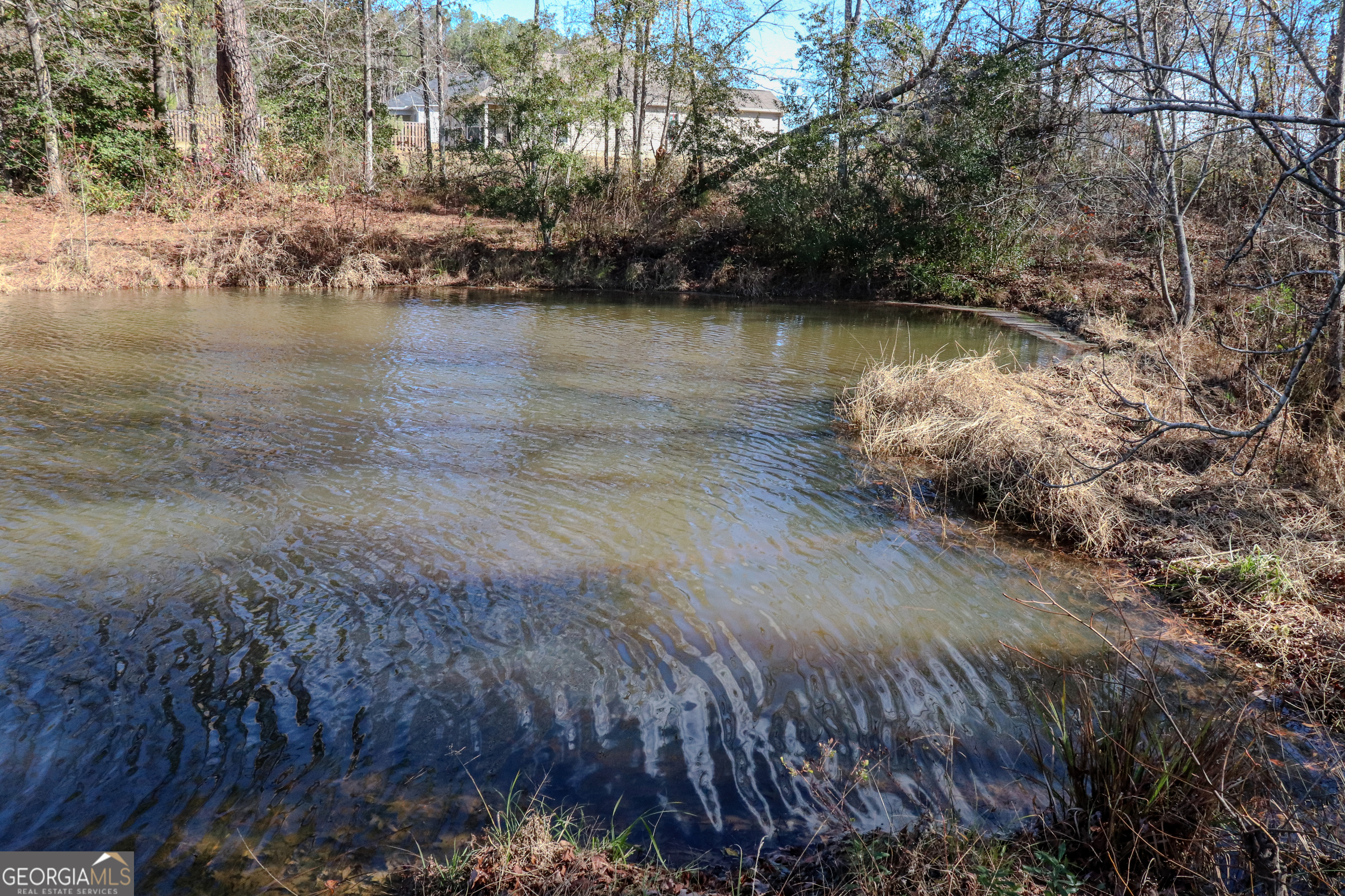 0 Hamilton Road Grovetown, GA 30813 - Photo 6 of 16 a view of a lake with houses
