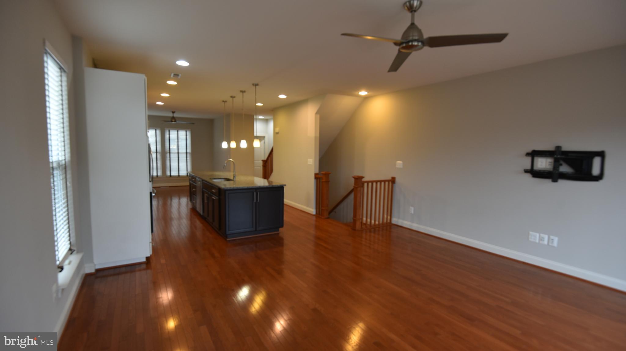 20425 Codman Drive Ashburn, VA 20147 - Photo 23 of 36 a view of a big room with wooden floor and windows