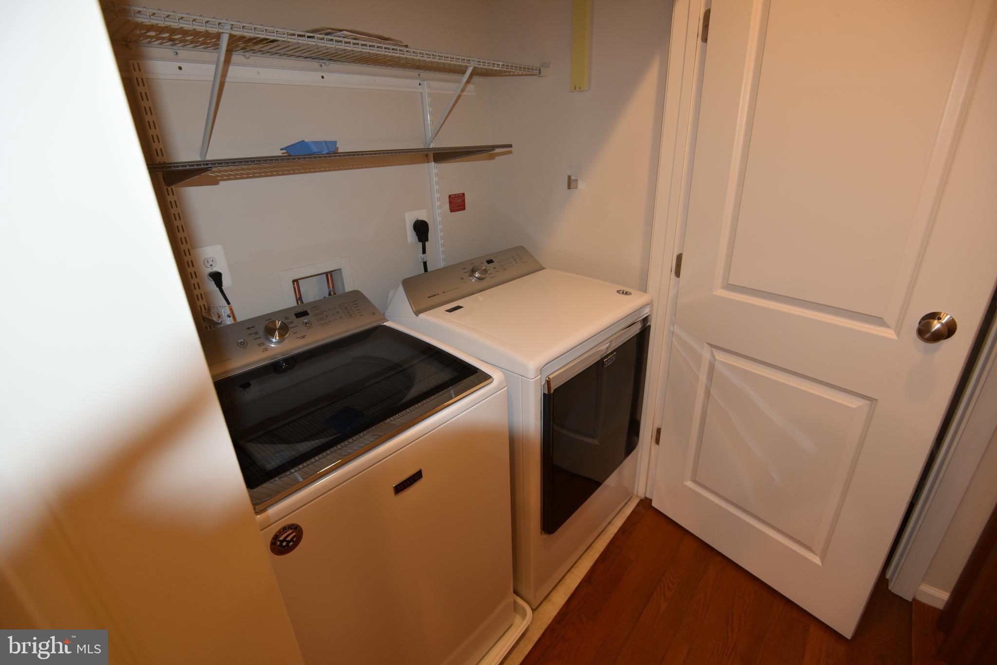 20425 Codman Drive Ashburn, VA 20147 - Photo 32 of 36 a utility room with dryer and washer
