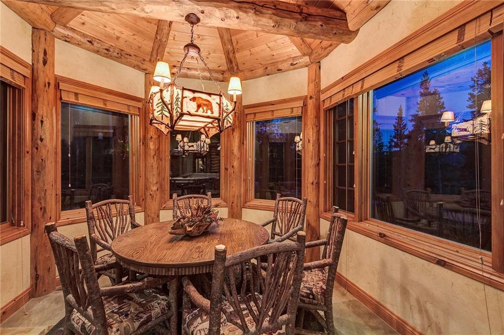 56 Rounds Road Breckenridge, CO 80424 - Photo 13 of 35 a view of a dining table and chairs in the patio