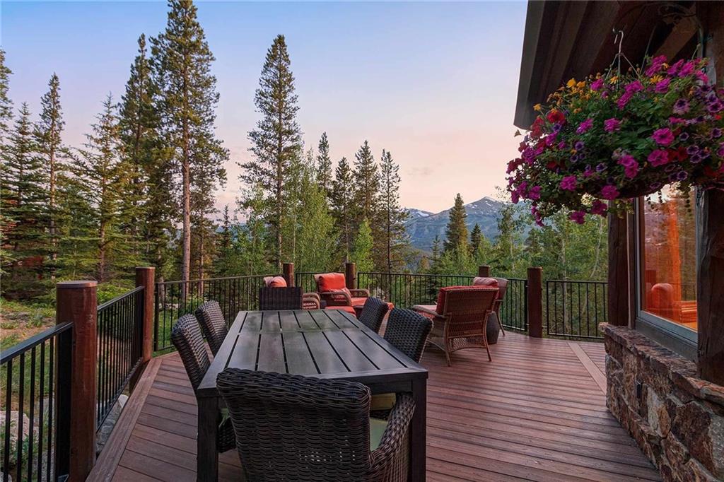 56 Rounds Road Breckenridge, CO 80424 - Photo 15 of 35 a view of a wooden chairs and table on the deck