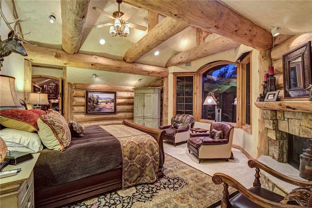 56 Rounds Road Breckenridge, CO 80424 - Photo 20 of 35 a bedroom with a bed a couch and the view of the kitchen