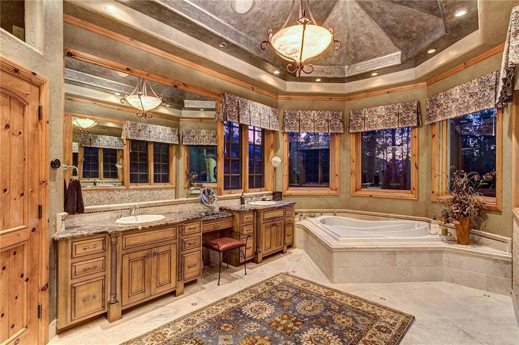 56 Rounds Road Breckenridge, CO 80424 - Photo 22 of 35 a spacious bathroom with a large tub and sink