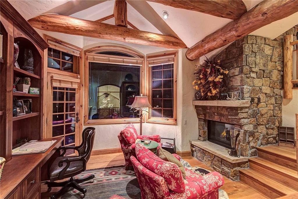 56 Rounds Road Breckenridge, CO 80424 - Photo 23 of 35 a living room with furniture and a fireplace