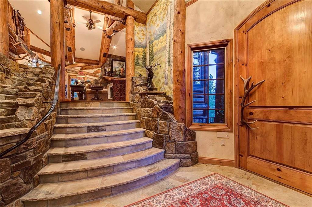 56 Rounds Road Breckenridge, CO 80424 - Photo 4 of 35 a view of staircase with white walls and windows