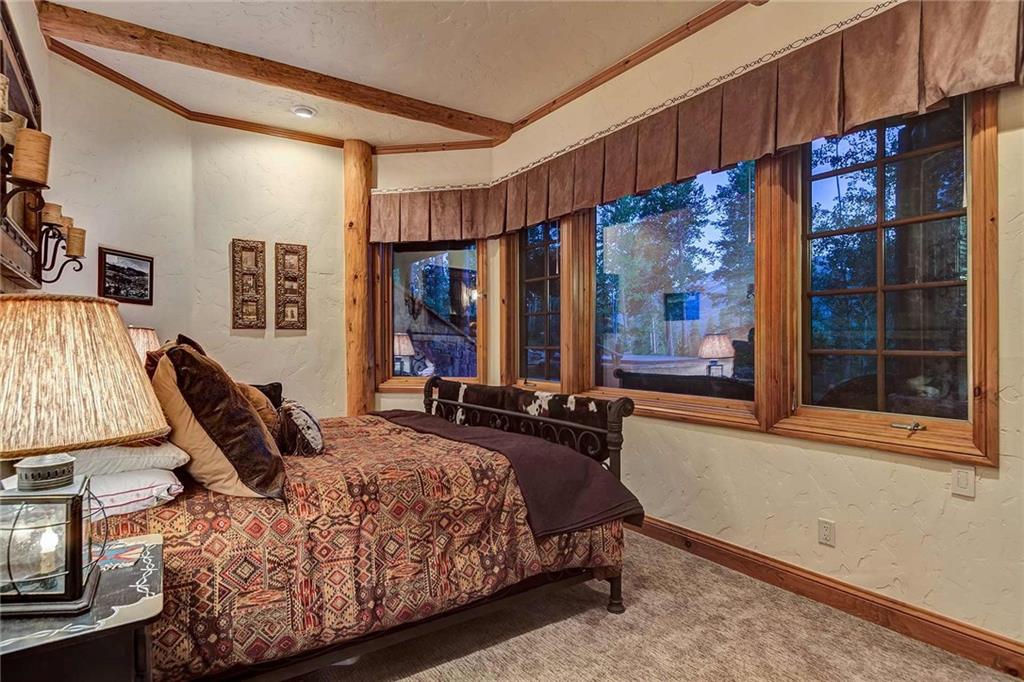 56 Rounds Road Breckenridge, CO 80424 - Photo 32 of 35 a bedroom with bed and window
