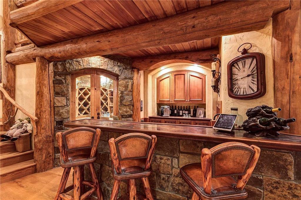 56 Rounds Road Breckenridge, CO 80424 - Photo 8 of 35 a dining room with furniture and a mirror