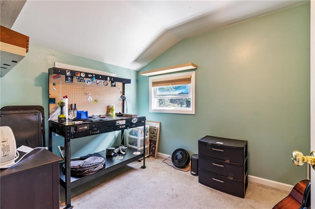 3702 Colby Street Pittsburgh, PA 15214 - Photo 14 of 21 a room with furniture and a flat screen tv