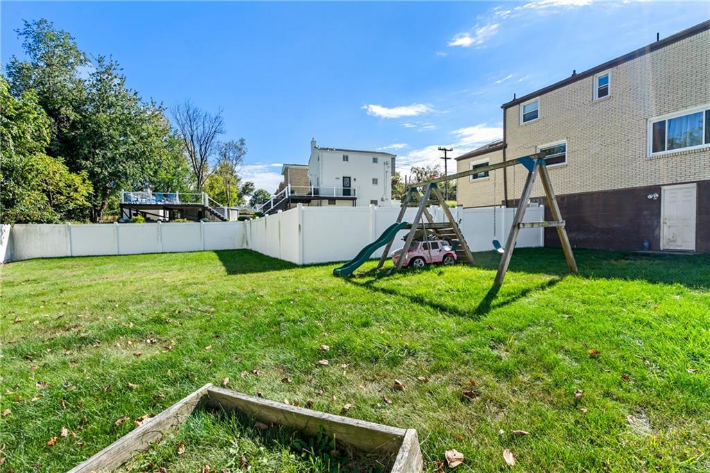 3702 Colby Street Pittsburgh, PA 15214 - Photo 17 of 21 a view of a backyard with a slide