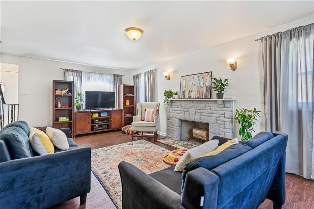 3702 Colby Street Pittsburgh, PA 15214 - Photo 3 of 21 a living room with furniture and a fireplace