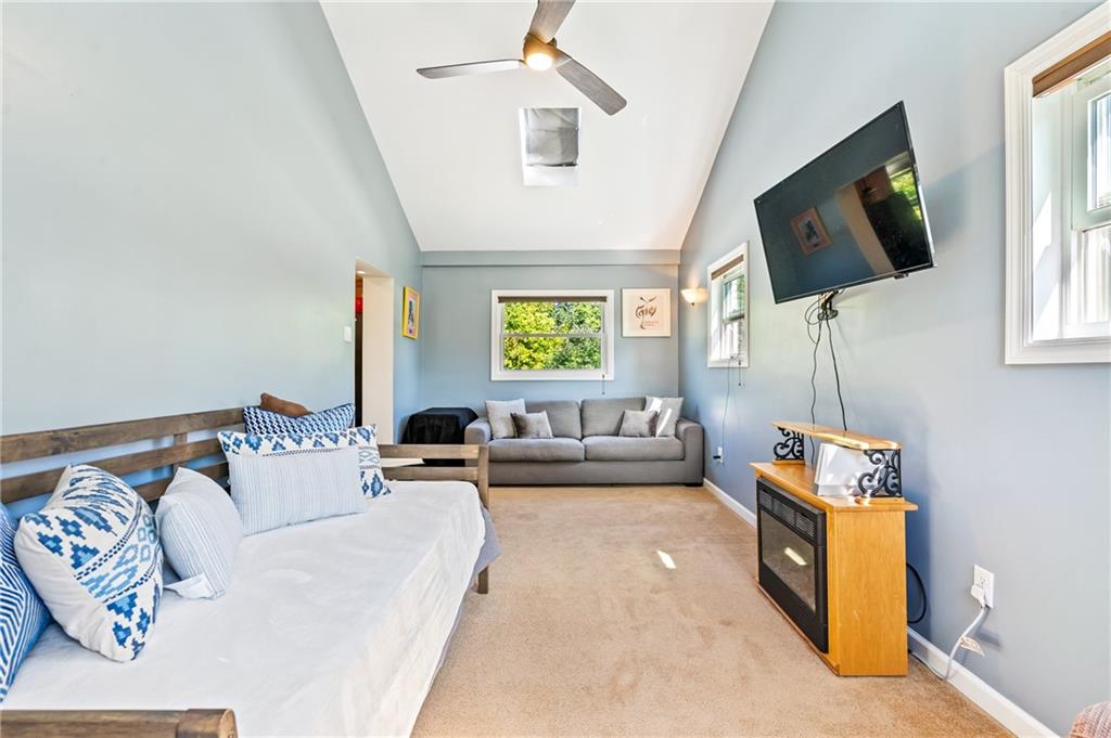 3702 Colby Street Pittsburgh, PA 15214 - Photo 10 of 21 a living room with furniture and a flat screen tv