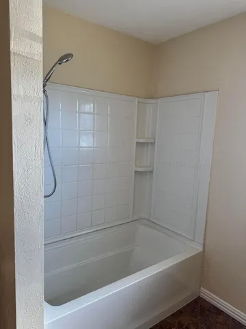 a bathroom with a bathtub