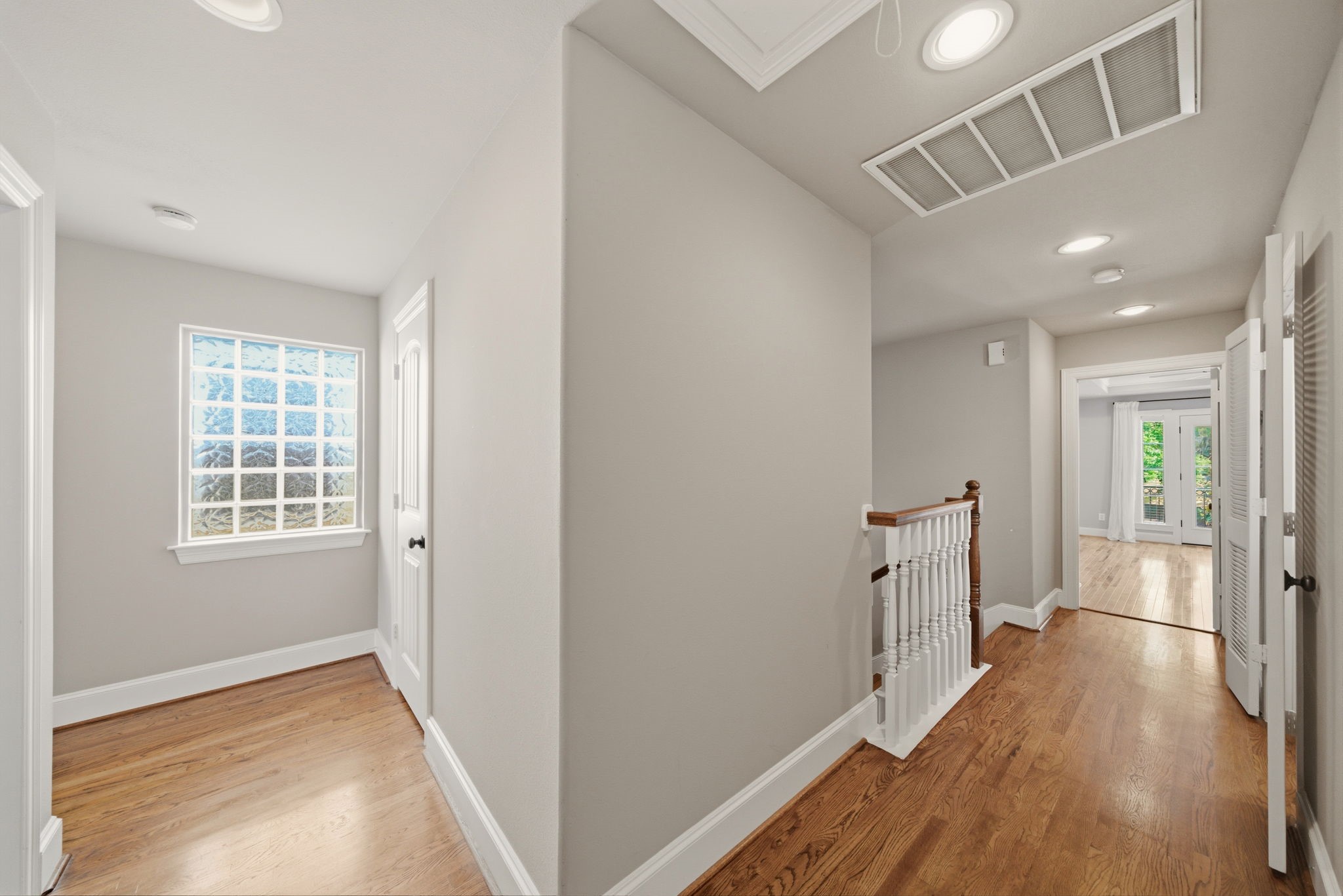 1007 Kern Street Houston, TX 77009 - Photo 20 of 35 a view of hallway with wooden floor