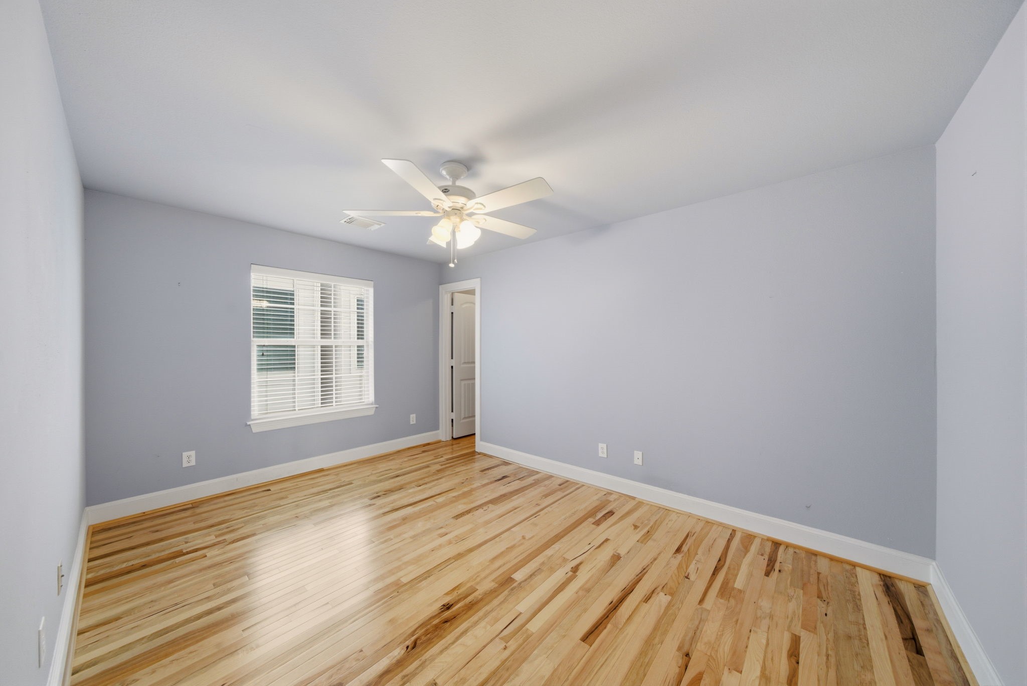 1007 Kern Street Houston, TX 77009 - Photo 21 of 35 wooden floor in an empty room with a window