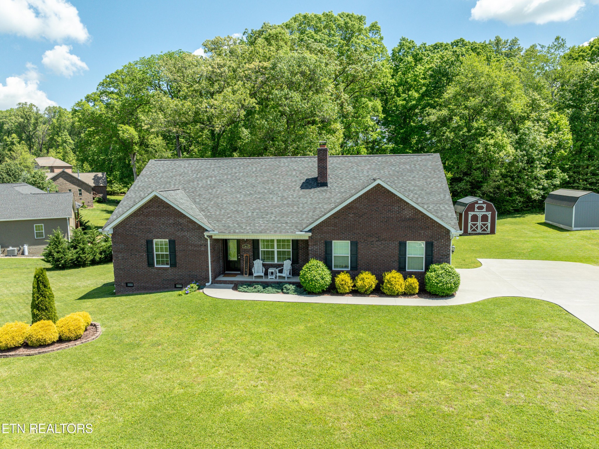 1303 Houston Springs Road Greenback, TN 37742 - Photo 1 of 31 a front view of house with yard and green space