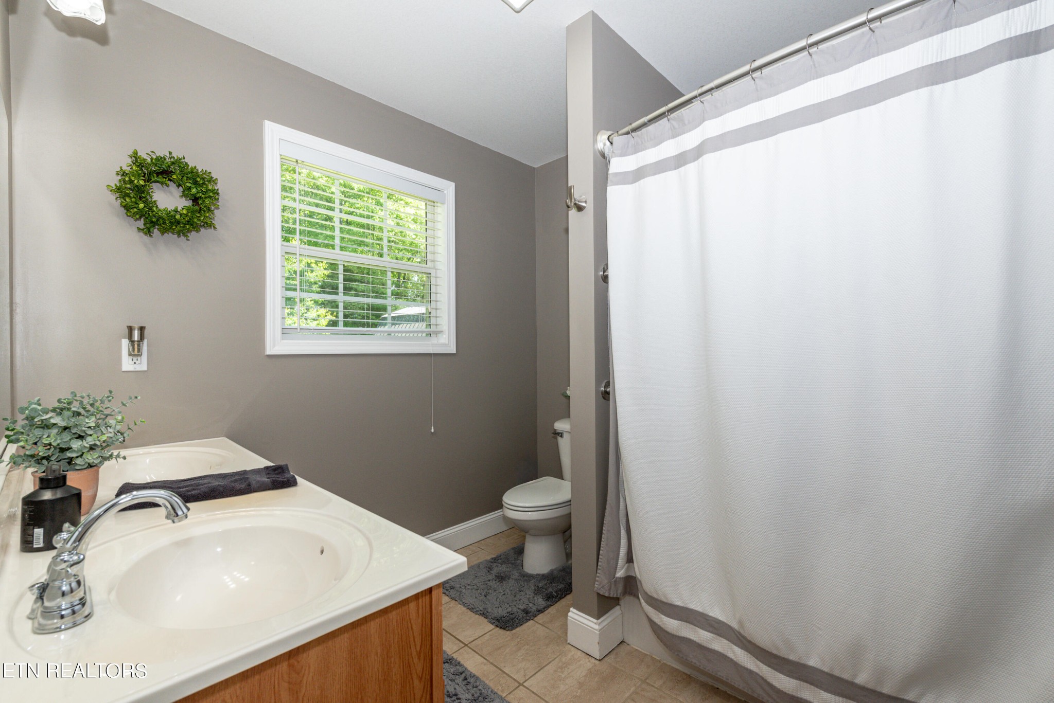 1303 Houston Springs Road Greenback, TN 37742 - Photo 21 of 31 a bathroom with a sink toilet and tub