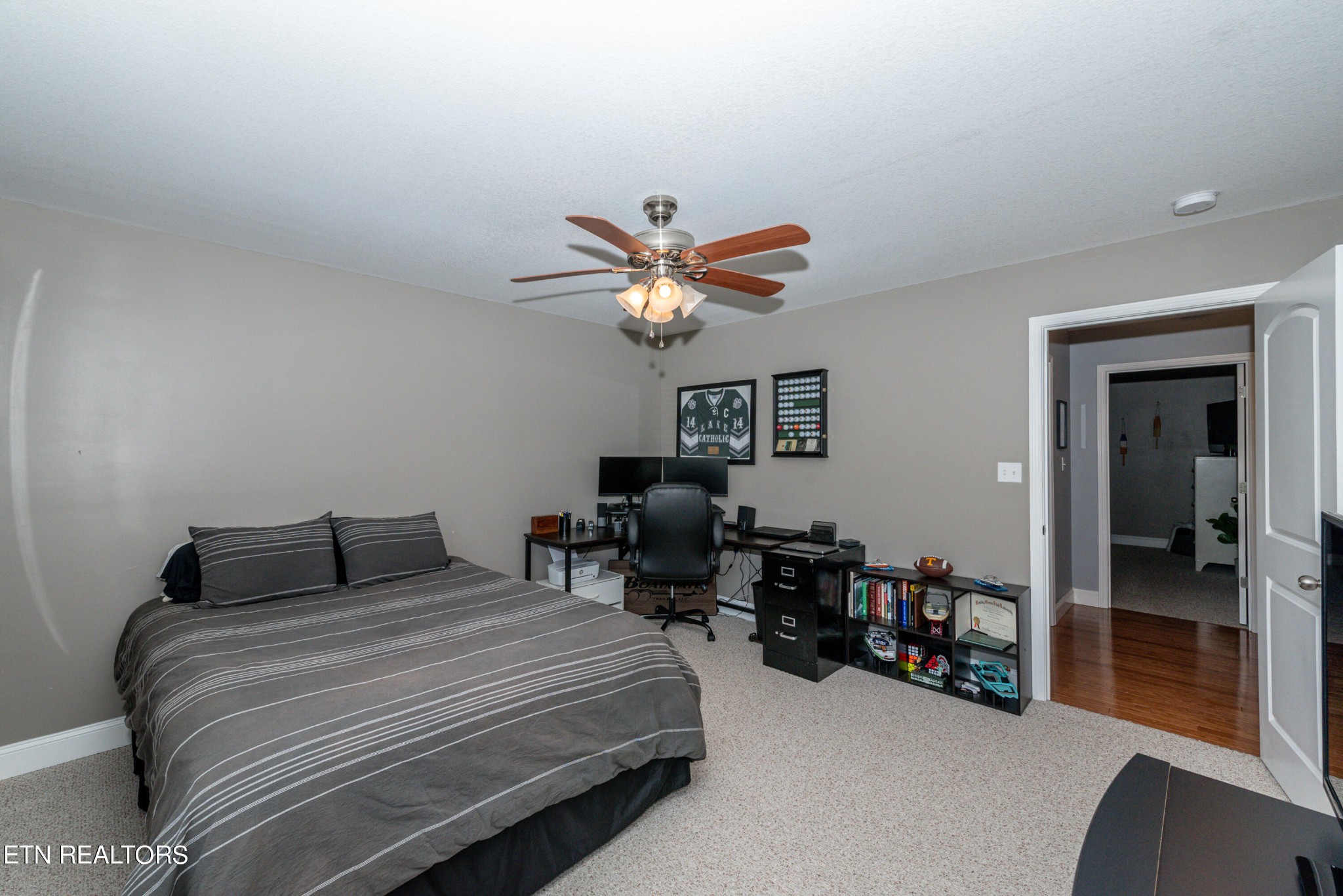 1303 Houston Springs Road Greenback, TN 37742 - Photo 26 of 31 a bedroom with bed and ceiling fan