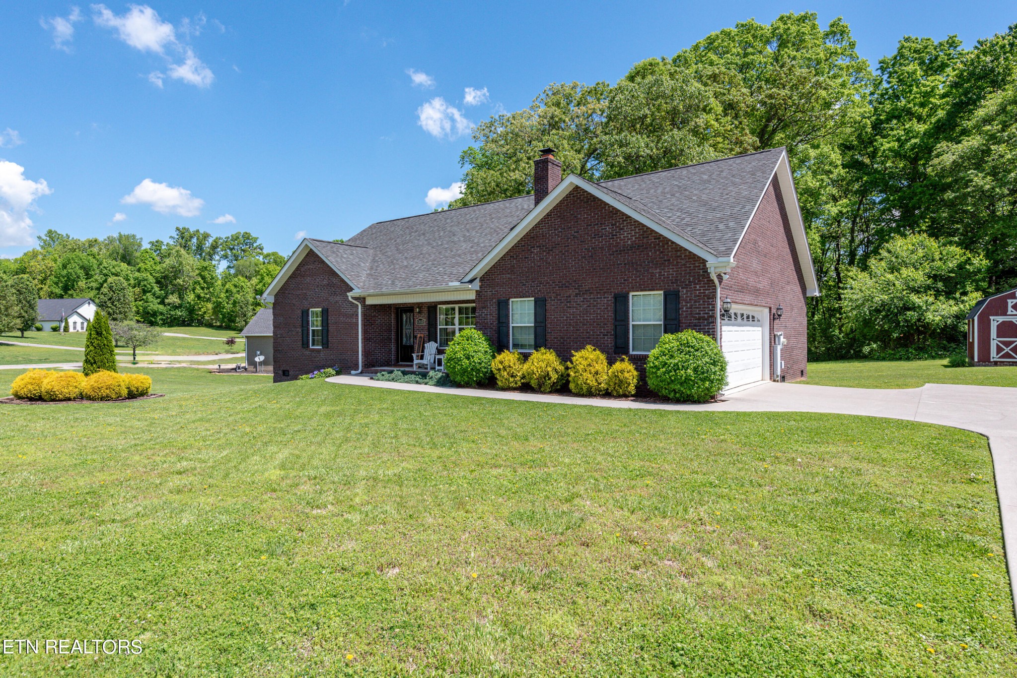 1303 Houston Springs Road Greenback, TN 37742 - Photo 4 of 31 a front view of house with yard and green space
