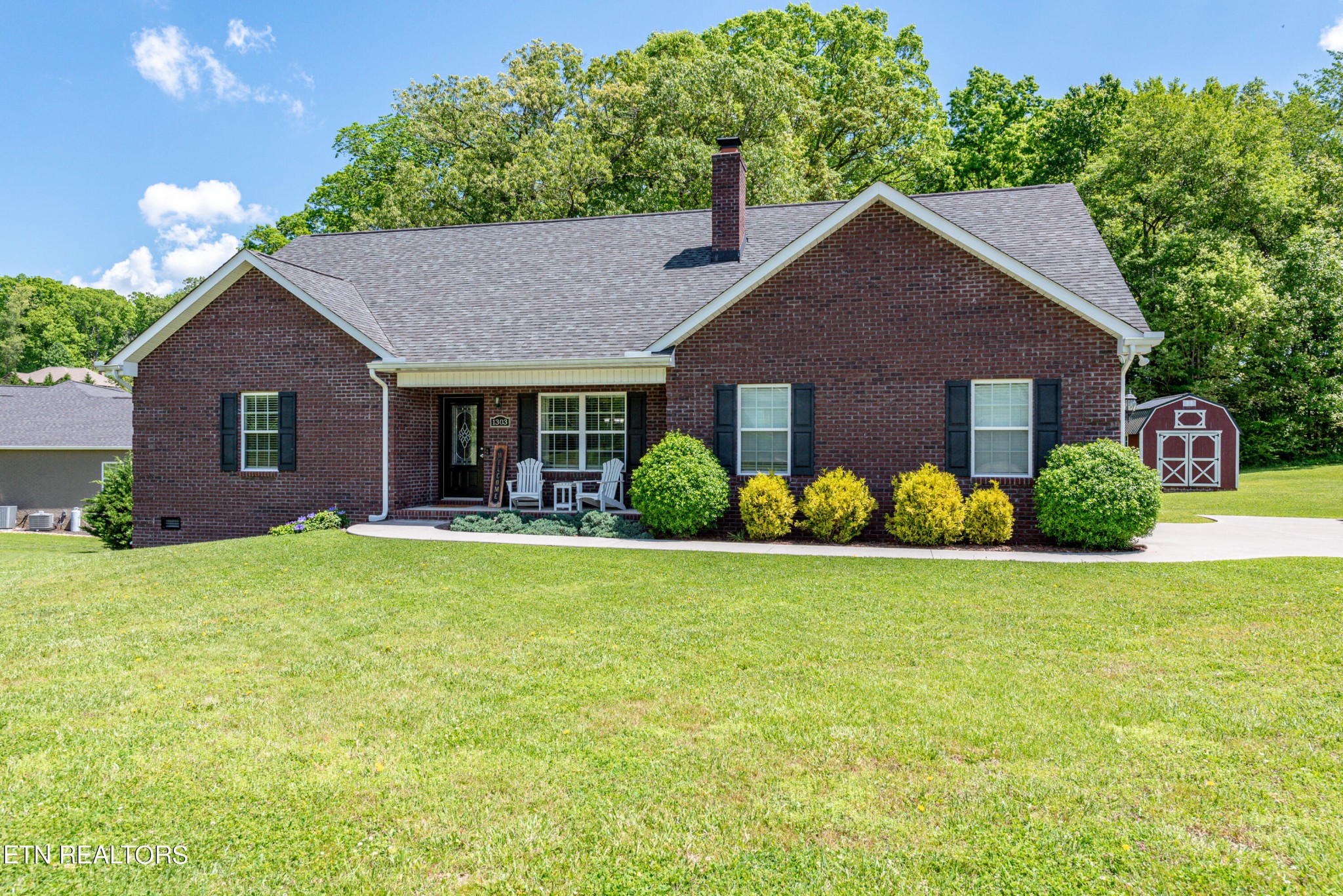 1303 Houston Springs Road Greenback, TN 37742 - Photo 6 of 31 a front view of a house with garden