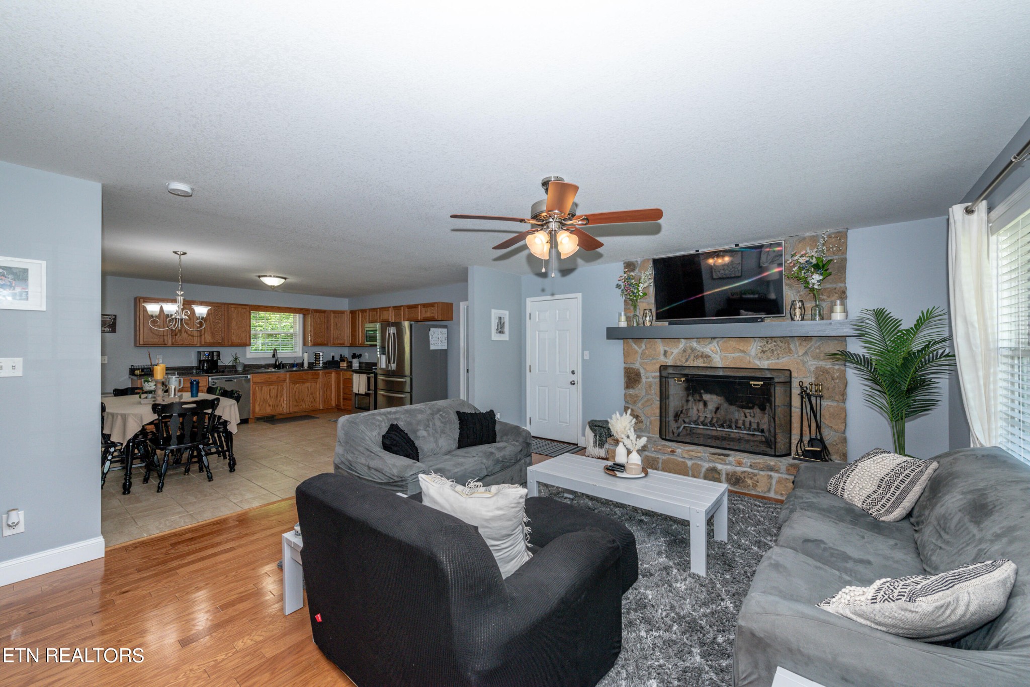 1303 Houston Springs Road Greenback, TN 37742 - Photo 8 of 31 a living room with furniture and a fireplace