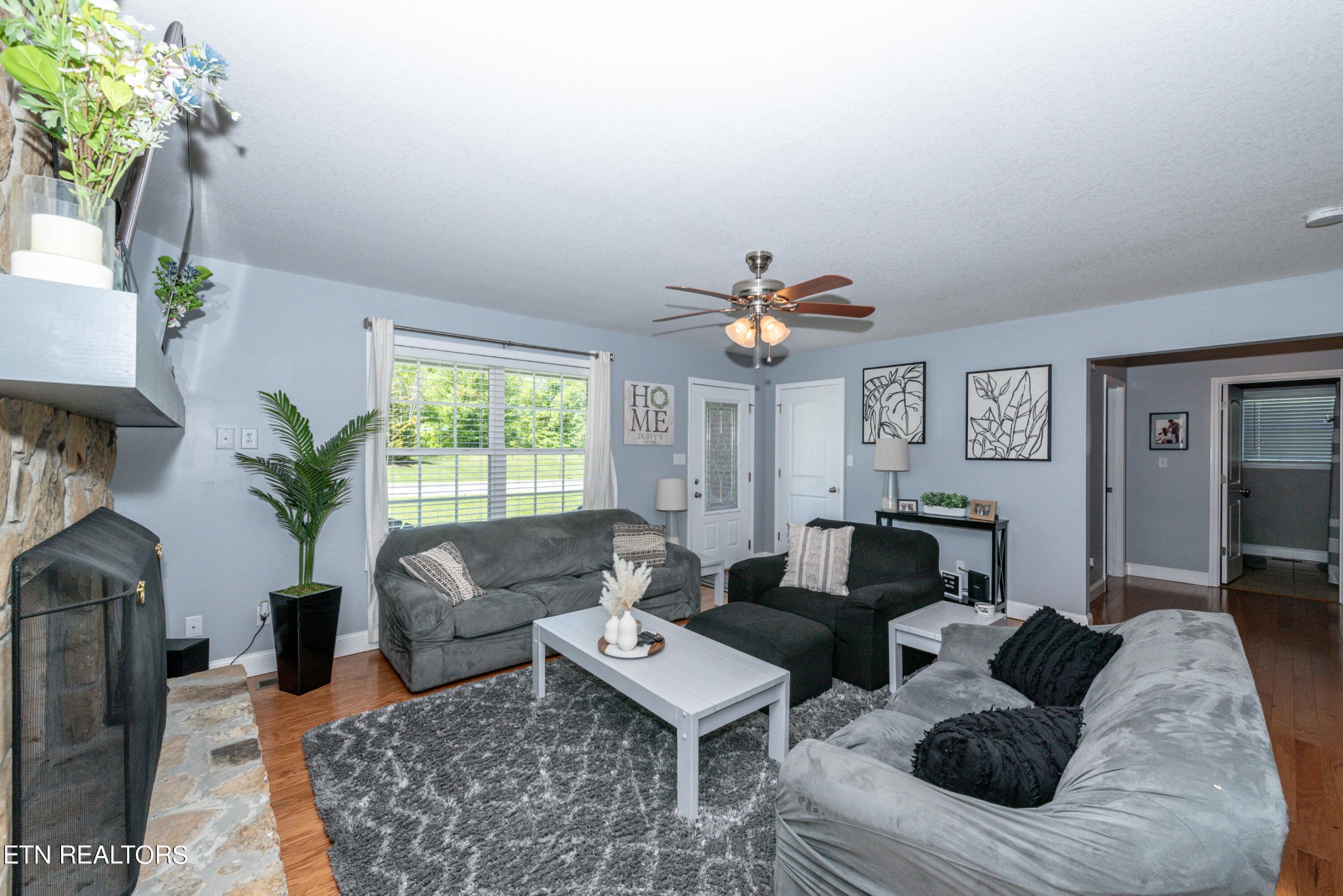 1303 Houston Springs Road Greenback, TN 37742 - Photo 9 of 31 a living room with furniture potted plant and a window