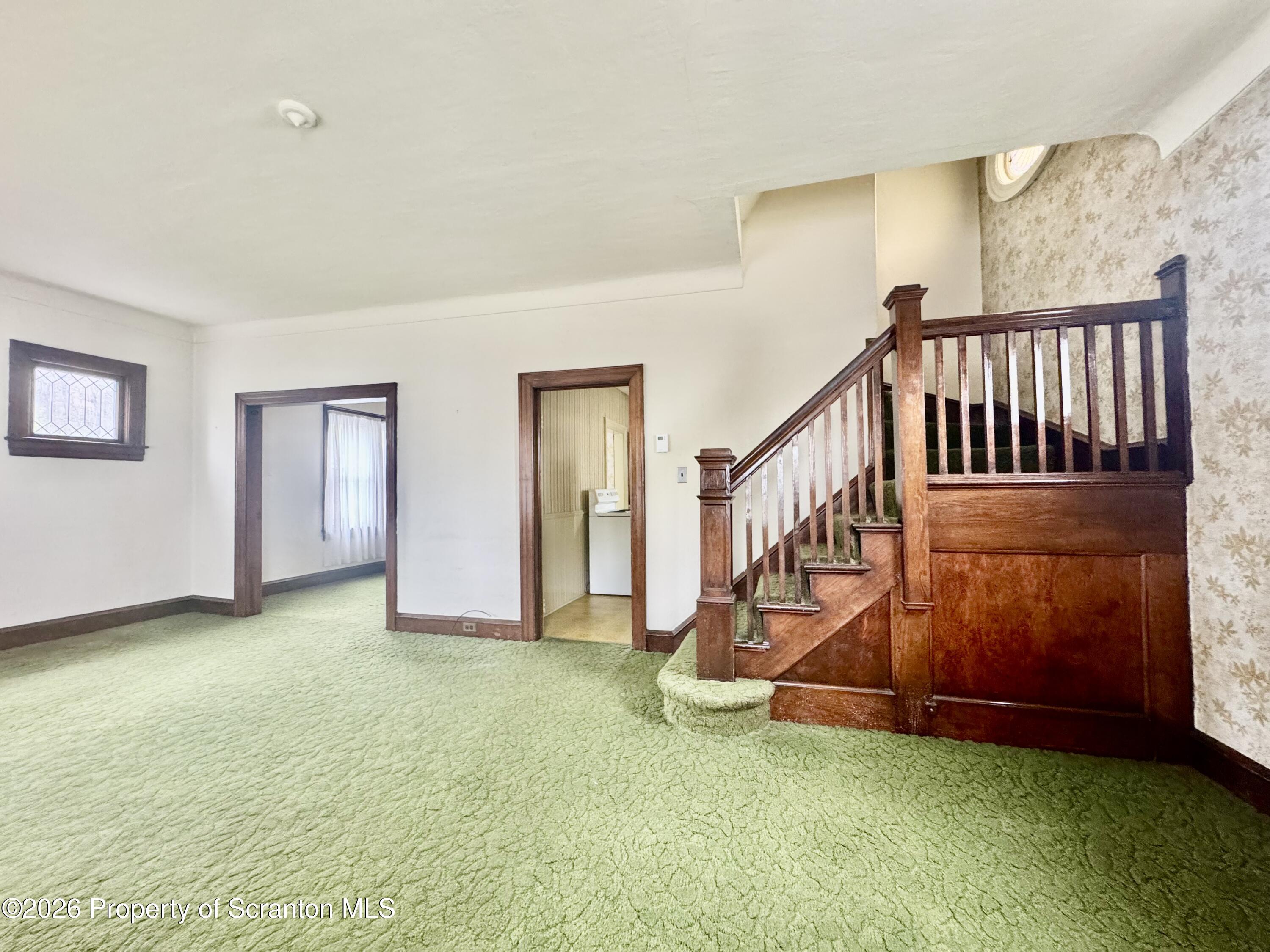 2120 Myrtle Street Scranton, PA 18510 - Photo 13 of 42 a view of an empty room with staircase pool and windows