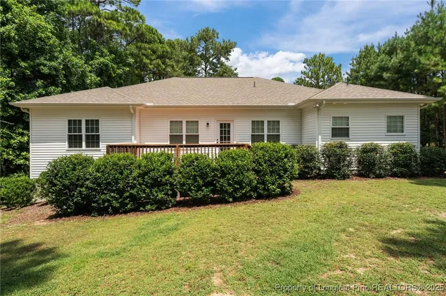 a view of balcony with wooden floor