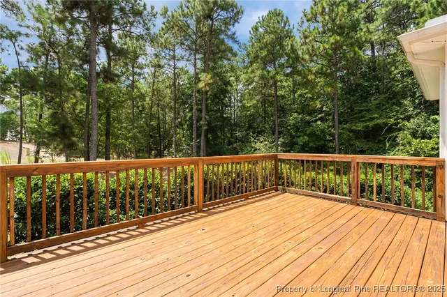 an aerial view of a houses with a yard