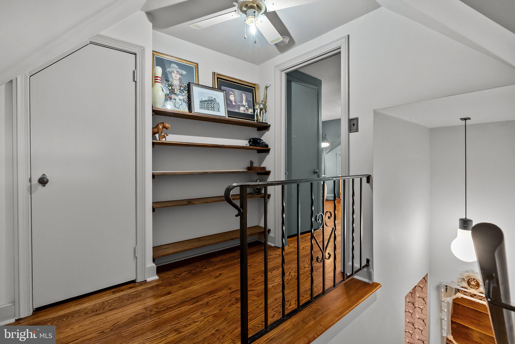 12 Chestnut Lane Wayne, PA 19087 - Photo 41 of 52 a view of a hallway with workspace and wooden floor
