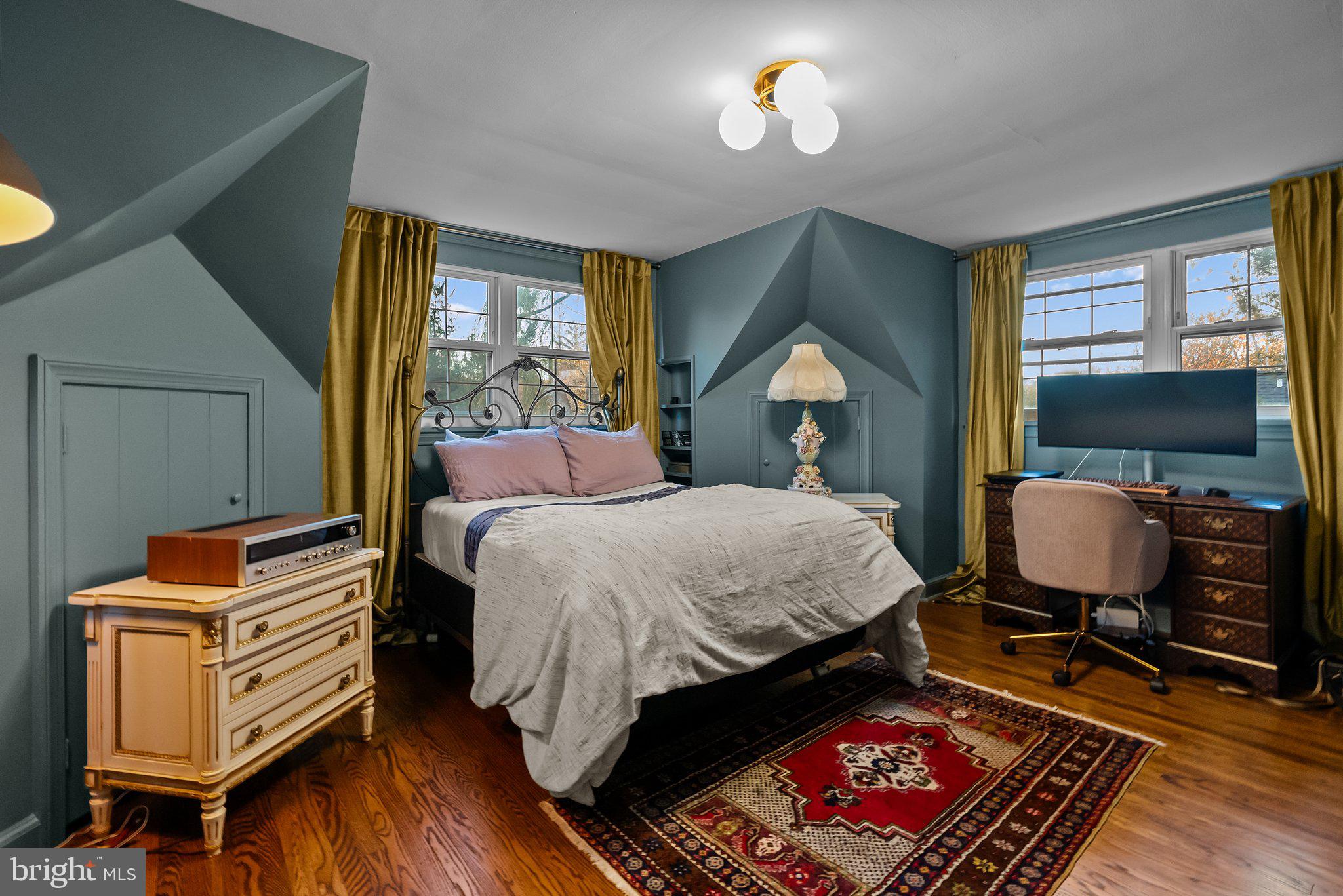 12 Chestnut Lane Wayne, PA 19087 - Photo 43 of 52 a bedroom with a bed wooden floor and window