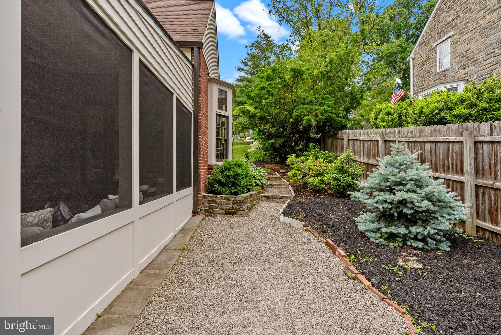 12 Chestnut Lane Wayne, PA 19087 - Photo 46 of 52 a view of backyard with potted plants and a large tree