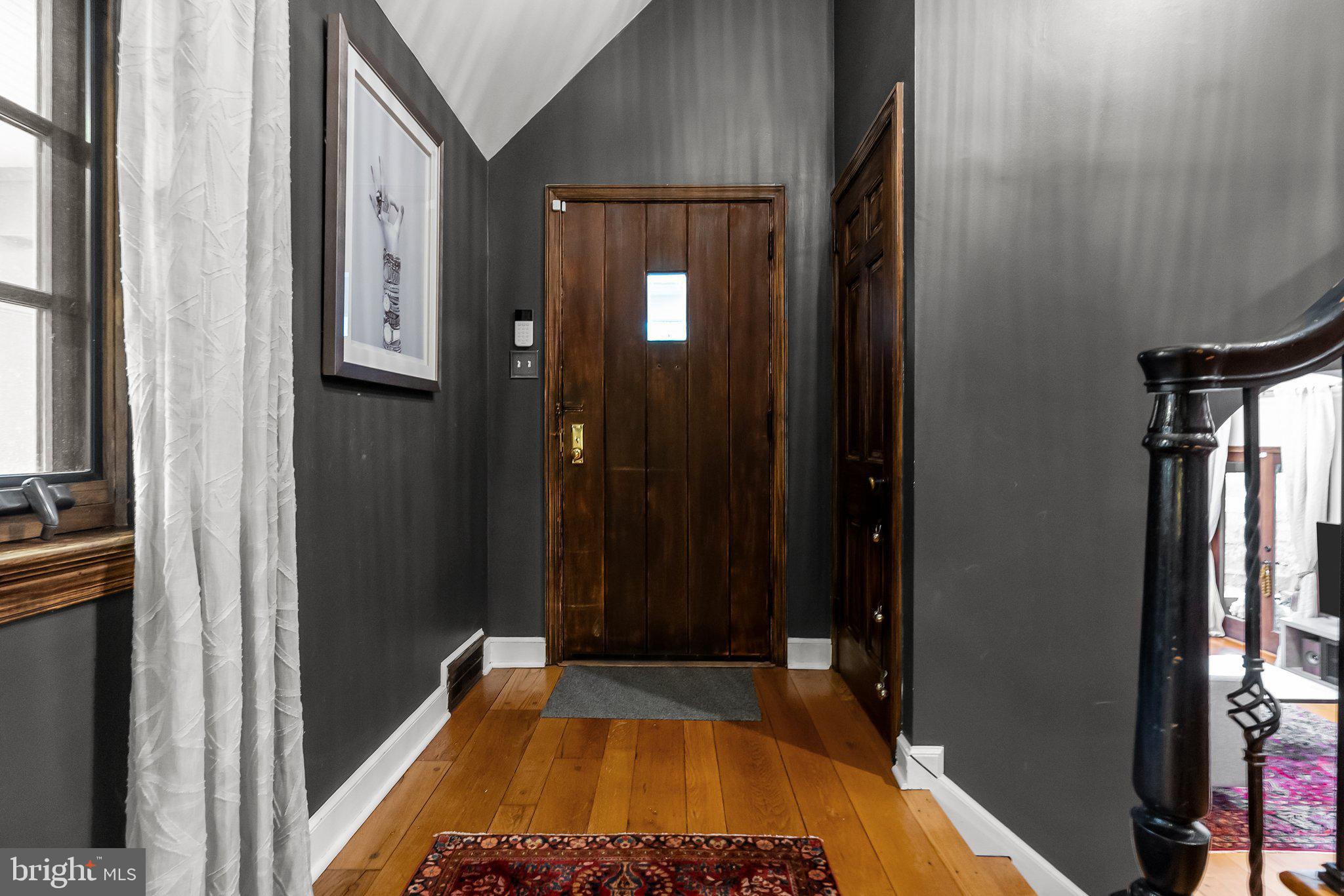 12 Chestnut Lane Wayne, PA 19087 - Photo 8 of 52 a bed room with a bed and a mirror