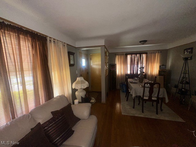 9717 Alexander Road Cleveland, OH 44125 - Photo 3 of 13 Dining room featuring wood finished floors and a textured ceiling