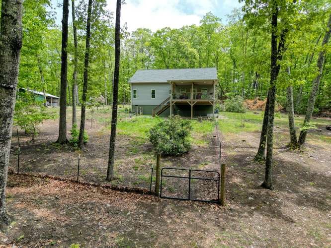 478 Flat Top Road Young Harris, GA 30582 - Photo 11 of 75 a view of a house with a backyard